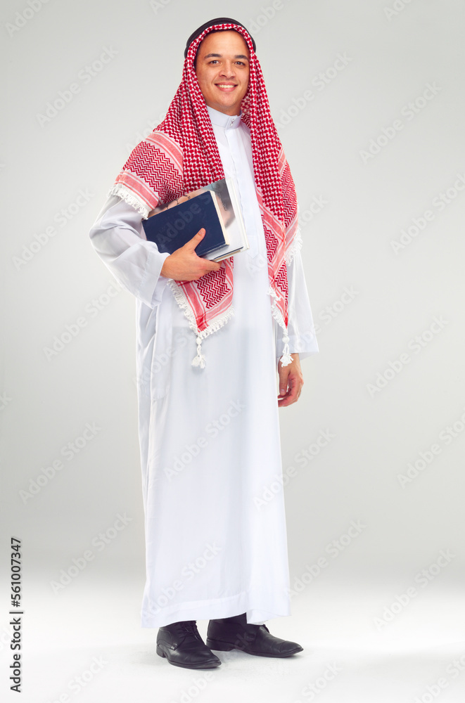 Portrait, Islamic man and books for education, knowledge and guy isolated on white studio background. Muslim, male and student with journals, smile and confident for studying, learning and university Portrait, Islamic man and books for education, knowledge and guy isolated on white studio background. Muslim, male and student with journals, smile and confident for studying, learning and university