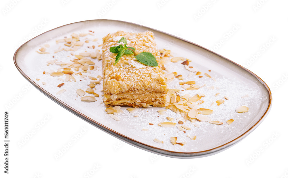 Napoleon Cake with almond on a white plate Napoleon Cake with almond on a white plate