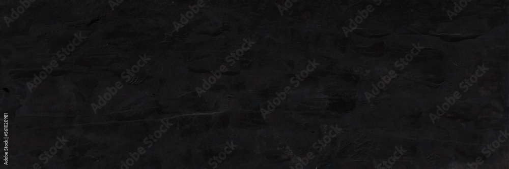 Dark gray grey anthracite black scratched damaged slate, shale natural stone concrete texture background banner panorama