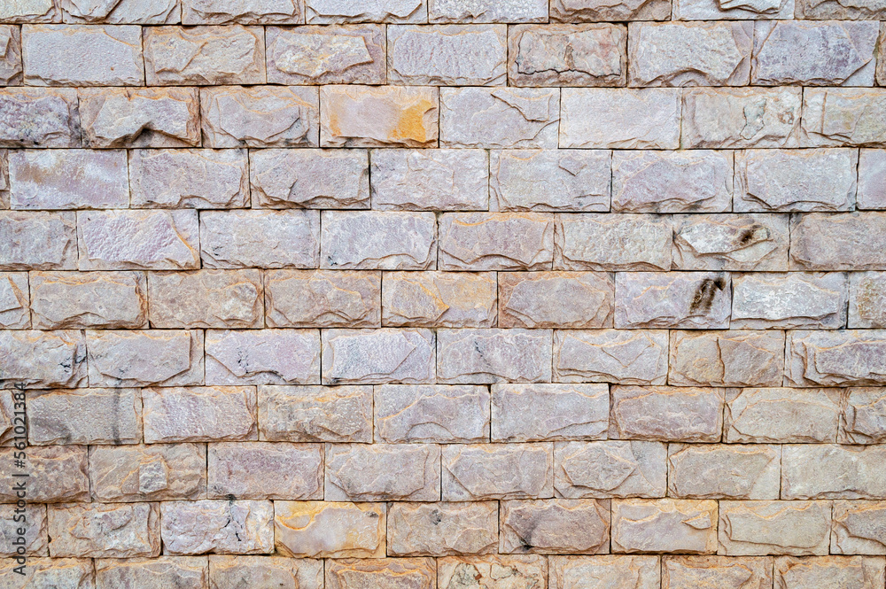 Fototapeta premium Colorful brick wall. Horizontal image. Advertising space.