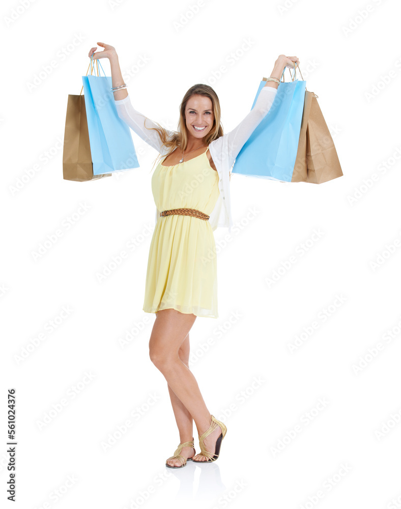 Shopping, fashion and woman excited on a white background in retail, designer clothes and cosmetics. Shopping bags, advertising and portrait of happy girl for promotion deal, sales and discount Shopping, fashion and woman excited on a white background in retail, designer clothes and cosmetics. Shopping bags, advertising and portrait of happy girl for promotion deal, sales and discount