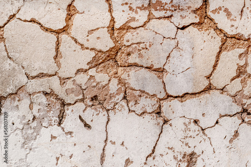 Cracked old plaster wall surface for texture background