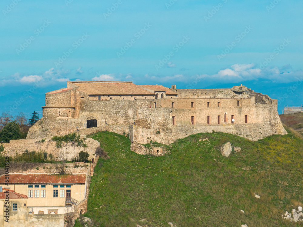 Aerial view of the Norman Swabian castle, Vibo Valentia, Calabria, Italy. Overview of the city seen from the sky, houses and rooftops.

