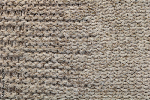Cozy Comfort: Close-up of a Textured Woolen Coat Fabric
