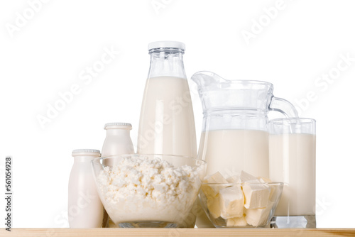 Glass of milk and dairy products on desk