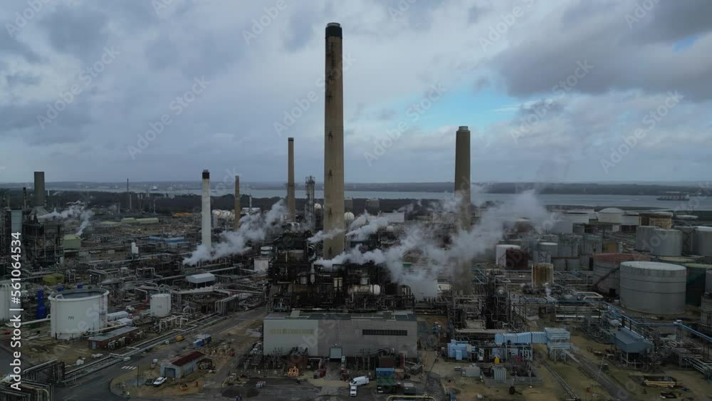 Oil refinery, aerial view. Diesel and gasoline production. Toxic emissions to the atmosphere, harm to the environment. Oil refinery, aerial view. Diesel and gasoline production. Toxic emissions to the atmosphere, harm to the environment.