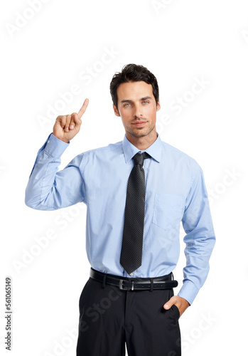 Businessman, studio portrait and point finger in air with confidence, vision and answer by backdrop. Corporate executive man, hand gesture or focus for work as financial advisor by white background