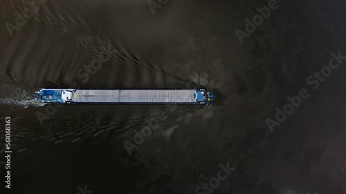 Foto Aerial view of a narrow boat on a river
