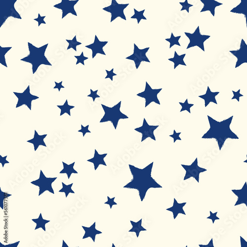 All over seamless repeat pattern with dark navy blue stars with grunge edges tossed on cream. Versatile trendy modern background