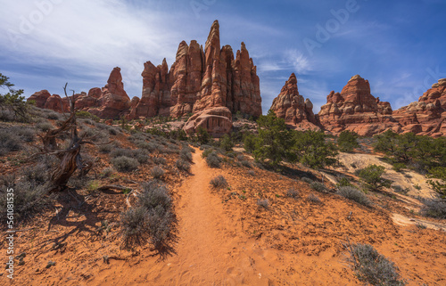 hiking the chesler park loop trail in the needles in canyonlands national park, usa