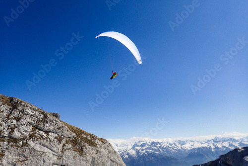 Paragliding in flight over the top