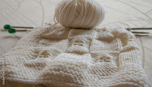 White knitting wool texture closeup, a ball of white wool background