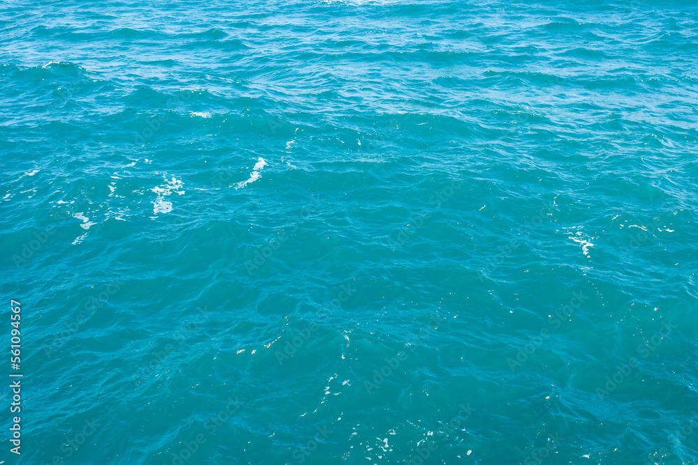 Background of aquamarine sea water surface  