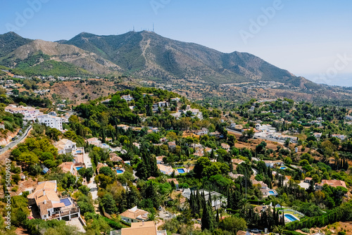 Mediterranean landscape, mountain backdrop, houses with pools near Malaga, Andalusia, Spain