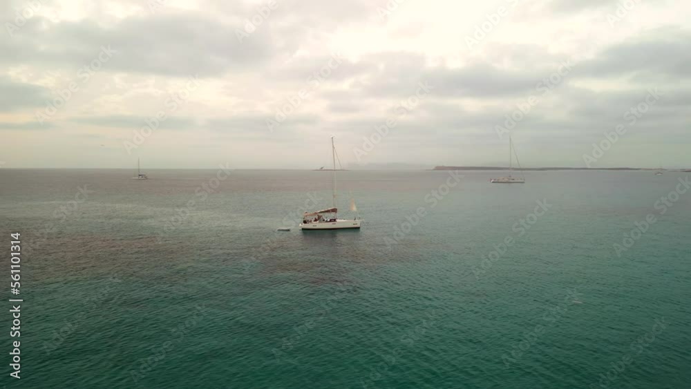Sailing yacht with dinghy formentera island. Majestic aerial view flight drone Sailing yacht with dinghy formentera island. Majestic aerial view flight drone