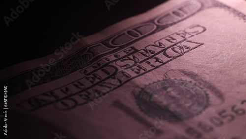 100 dollars rotating, inflation, soft light