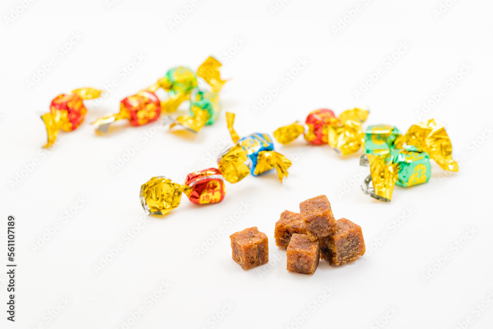 Casual snack beef cubes on a solid color background Casual snack beef cubes on a solid color background