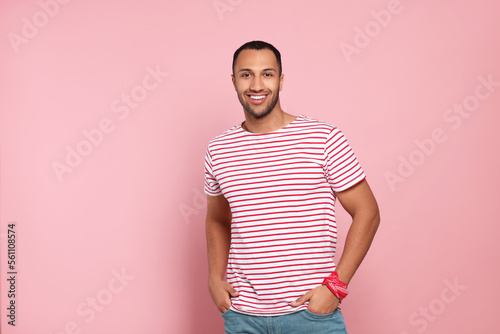 Wallpaper Mural Portrait of happy African American man on pink background. Space for text Torontodigital.ca