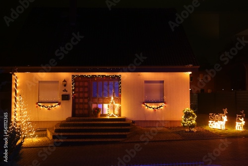 Beautiful house decorated for Christmas. Festive decor © New Africa