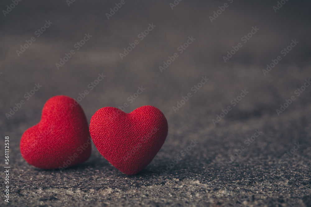two red hearts on wooden background two red hearts on wooden background