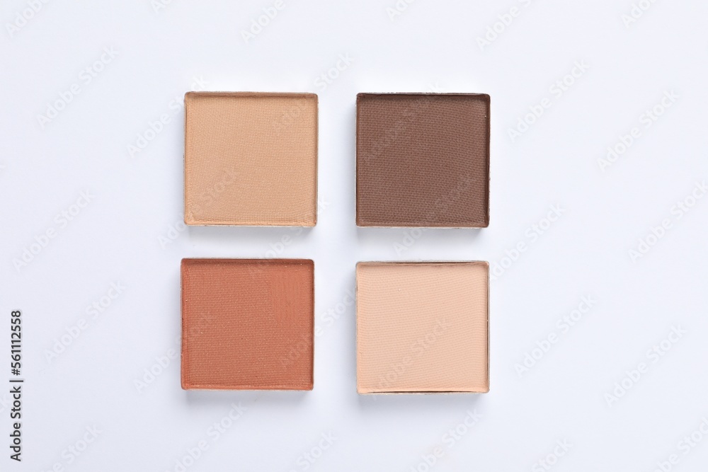 Beautiful eye shadow refill pans on white background, flat lay Beautiful eye shadow refill pans on white background, flat lay