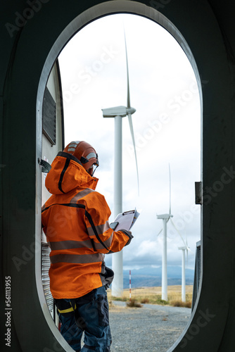 tecnician working in windfarm photo