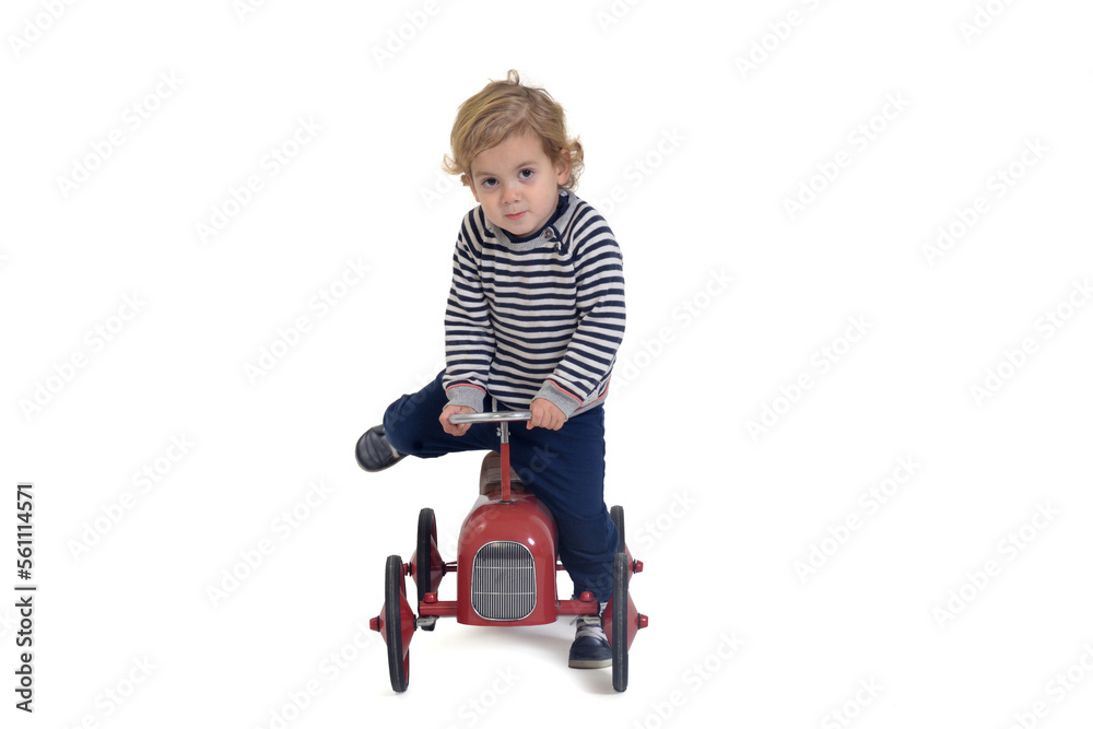 103 / 5.000.Resultaos de traducción.Resultado de traducción..front view of a baby playing with a toy car going in and out of the car on white background 103 / 5.000.Resultaos de traducción.Resultado de traducción..front view of a baby playing with a toy car going in and out of the car on white background