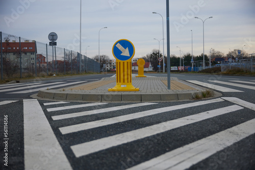 Sign of detour obstacles on the left or on the right with cracked white color paint texture. Detour obstacles on the left or on the right.