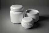  a white jar and a white container on a gray background with a white lid and a white cap on the top of the jar are both of the same size and the same size and the same.