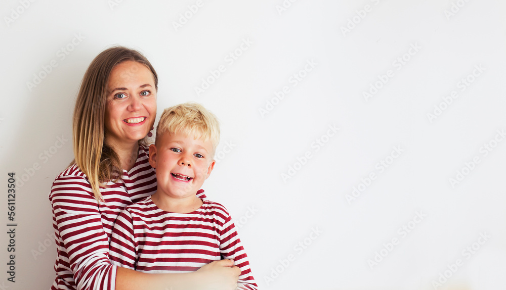 happy cheerful family ,mother and her son smiling over white background happy cheerful family ,mother and her son smiling over white background