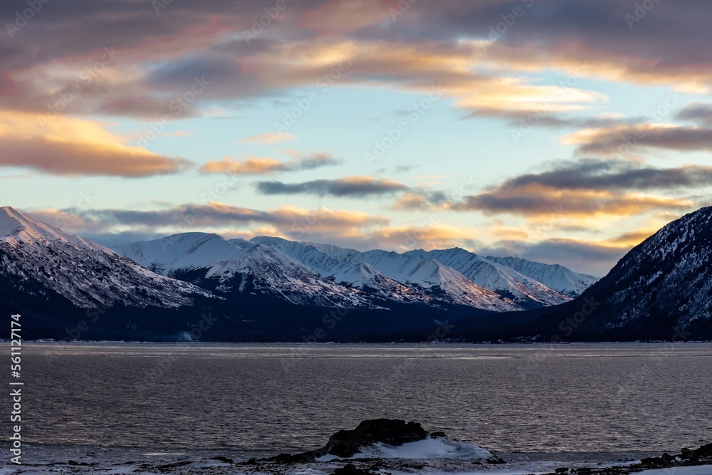 awe-inspiring snow-covered mountains in Anchorage, Alaska looking over Chickaloon Bay and Turnagain Arm during cold winter