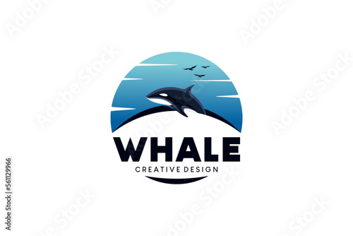 Whale logo design with blue sky background