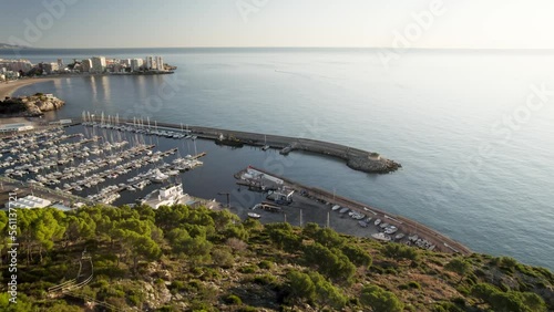 Slow 4K drone fly by aerial video of Oropesa del Mar sport port in the Mediterranean Sea in Spain photo