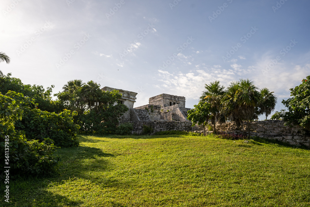 The ruins of a beautiful pyramid in the archaeological zone of Tulum in Mexico.