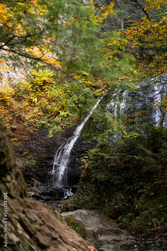 Fall Foliage at a waterfall in Stowe, Vermont Fall Foliage at a waterfall in Stowe, Vermont
