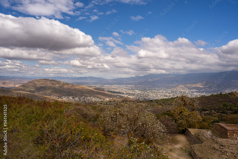 Beautiful view of the large Mexican city of Oaxaca from Monte Alban. View of the endless mountain peaks.