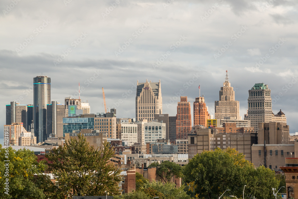 View of landmark downtown Detroit, Michigan skyline as seen from the Cass corridor midtown area. Shot during a sun and clouds mixed afternoon. September 2022.