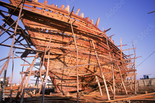 wooden boat in cradle/staging
