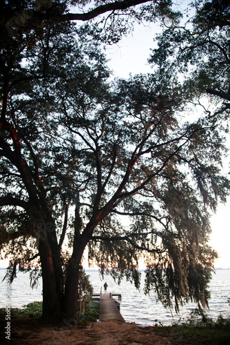 A man stands on a dock on Lake Seminole during his 2-month float from the headwaters of the Chattahoochee River to the mouth of the Apalachicola River and Apalachicola Bay in Flori