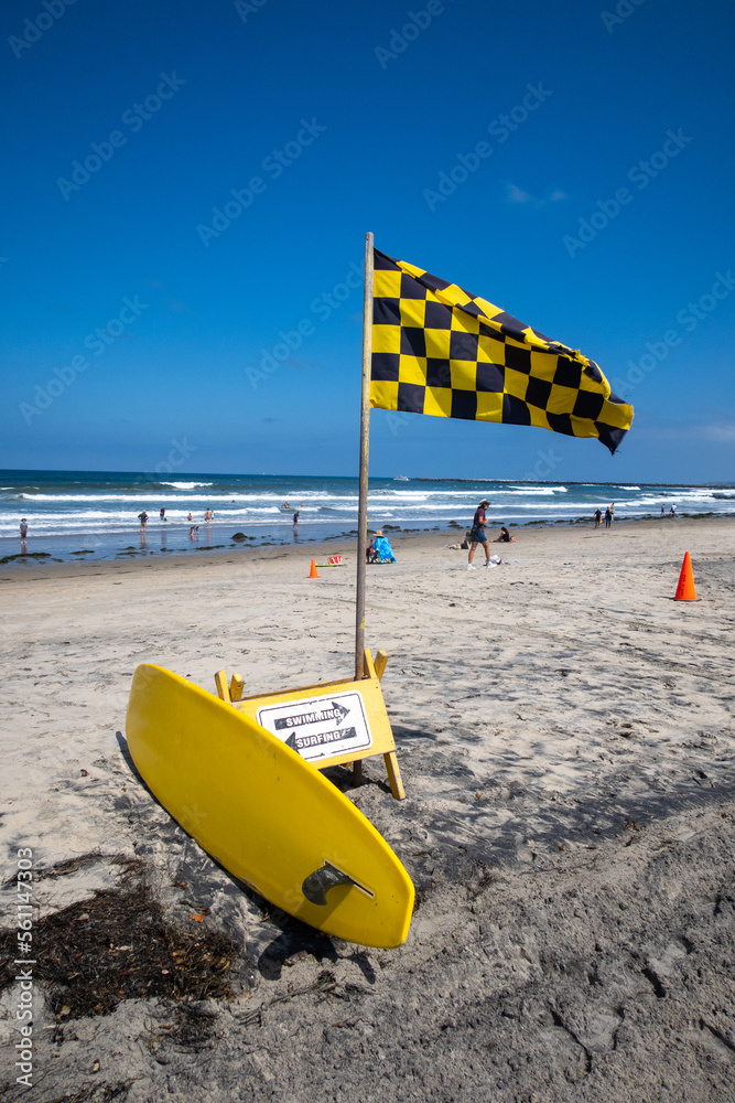San Diego, California, May 13, 2022: A Surf Warning Flag to Warn Surfers to be Careful San Diego, California, May 13, 2022: A Surf Warning Flag to Warn Surfers to be Careful