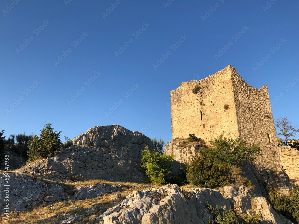 Ruins of old mediaval castle of Bargeme in the warm evening light, Provence, Var, France