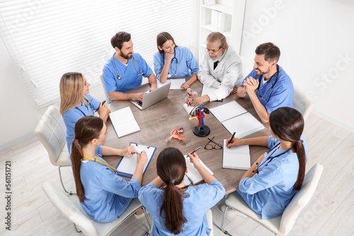 Doctor giving lecture for interns in university  above view