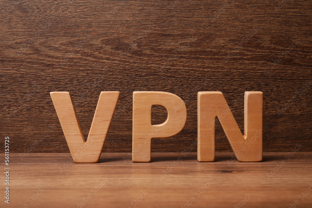 Acronym VPN made of wooden letters on table Acronym VPN made of wooden letters on table