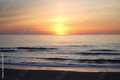 sunset on the beach © edward