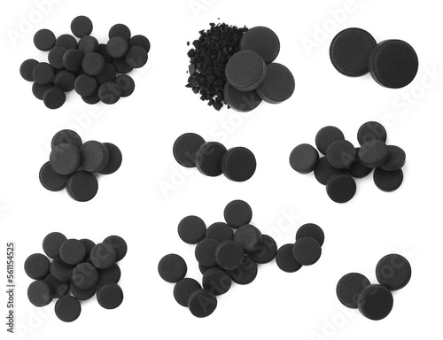 Cuadro en lienzo Set with activated charcoal pills on white background, top view