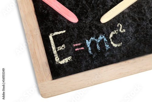 The formula E=mc2 on a chalk blackboard at school
