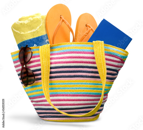 Beach accessories in bag. Summer vacations. photo