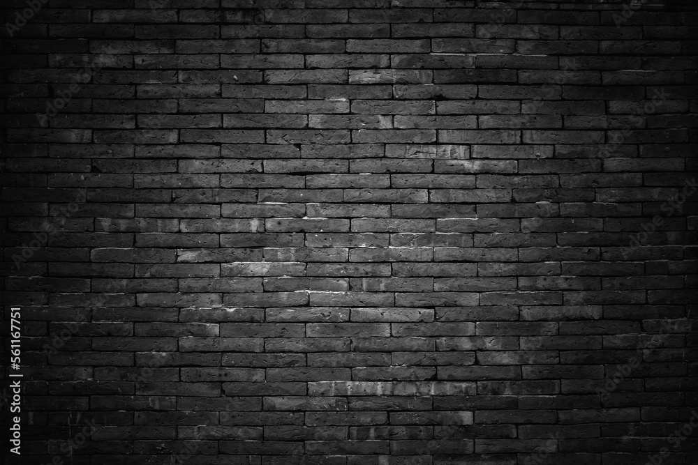 Old vintage retro style dark bricks wall for abstract brick background and texture.