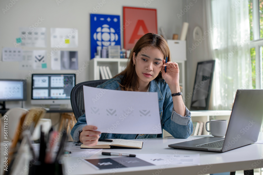 Asian woman Graphic designer working in office. Artist Creative Designer Illustrator Graphic Skill Concept. Asian woman Graphic designer working in office. Artist Creative Designer Illustrator Graphic Skill Concept.