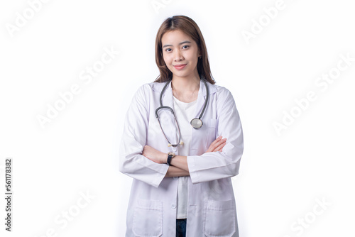 Portrait of Asian woman doctor wearing uniform stand isolated on white background. Female medical nurse or practitioner with stethoscope look at camera. Healthcare concept
